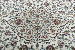 Central medallion detail of 2000s Kashan rug from Iran / Persia