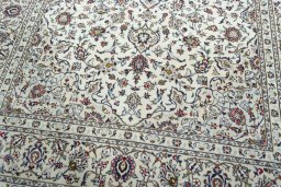 Close-up detail of 2000s Kashan rug from Iran / Persia showing Wool weave