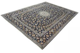 Corner detail of 2000s Kashan rug showing border pattern and Wool pile