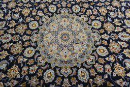 Central medallion detail of 2000s Kashan rug from Iran / Persia