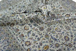 Surface texture of 2000s Kashan rug with natural Wool and intricate pattern