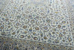 Close-up detail of 2000s Kashan rug from Iran / Persia showing Wool weave