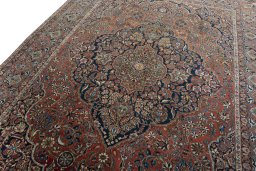 Backside of handmade 1930s Kashan rug showing knot structure and weave density