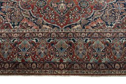 Full view of 1930s Kashan rug from Iran / Persia, 371 × 272 cm in Red tones