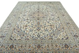 Surface texture of 2000s Kashan rug with natural Wool and intricate pattern