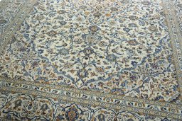 Close-up detail of 2000s Kashan rug from Iran / Persia showing Wool weave