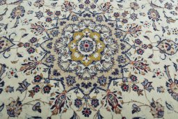 Central medallion detail of 2000s Kashan rug from Iran / Persia