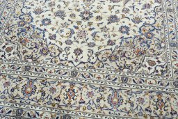 Close-up detail of 2000s Kashan rug from Iran / Persia showing Wool weave