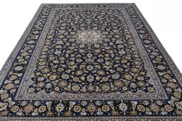 Surface texture of 2000s Kashan rug with natural Wool and intricate pattern