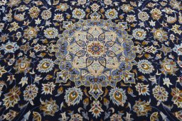 Central medallion detail of 2000s Kashan rug from Iran / Persia
