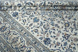 Close-up detail of 2000s Kashan rug from Iran / Persia showing Wool weave