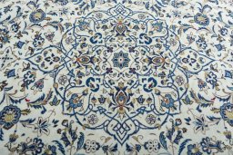 Central medallion detail of 2000s Kashan rug from Iran / Persia