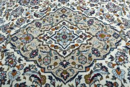 Central medallion detail of 2000s Kashan rug from Iran / Persia