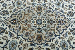 Central medallion detail of 2000s Kashan rug from Iran / Persia