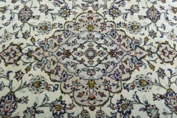 Central medallion detail of 2000s Kashan rug from Iran / Persia