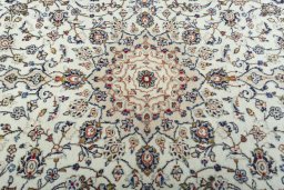 Central medallion detail of 2000s Kashan rug from Iran / Persia