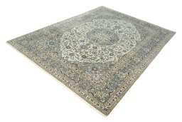 Corner detail of 2000s Kashan rug showing border pattern and Wool pile