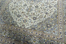 Close-up detail of 2000s Kashan rug from Iran / Persia showing Wool weave