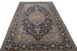 Surface texture of 2000s Kashan rug with natural Wool and intricate pattern