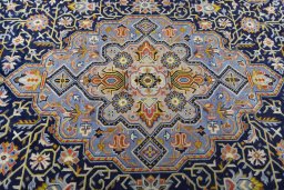 Central medallion detail of 2000s Kashan rug from Iran / Persia