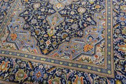 Close-up detail of 2000s Kashan rug from Iran / Persia showing Wool weave