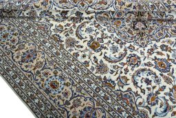 Close-up detail of 2000s Kashan rug from Iran / Persia showing Wool weave