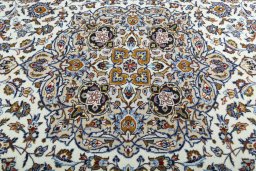 Central medallion detail of 2000s Kashan rug from Iran / Persia