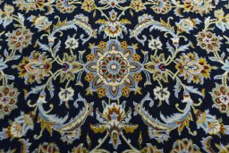 Central medallion detail of 2000s Kashan rug from Iran / Persia