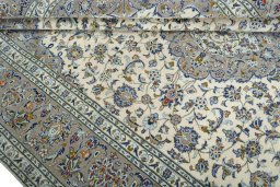 Close-up detail of 2000s Kashan rug from Iran / Persia showing Wool weave