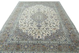 Surface texture of 2000s Kashan rug with natural Wool and intricate pattern