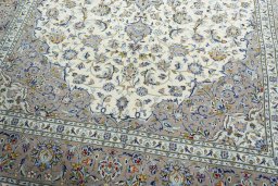 Close-up detail of 2000s Kashan rug from Iran / Persia showing Wool weave