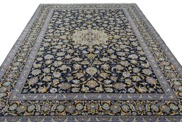 Surface texture of 2000s Kashan rug with natural Wool and intricate pattern