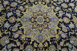 Central medallion detail of 2000s Kashan rug from Iran / Persia