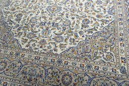Close-up detail of 2000s Kashan rug from Iran / Persia showing Wool weave