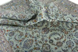 Surface texture of 1970s Kashan rug with natural Wool and intricate pattern