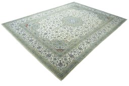 Corner detail of 2000s Kashan rug showing border pattern and Wool pile