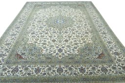 Surface texture of 2000s Kashan rug with natural Wool and intricate pattern