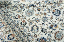 Close-up detail of 2000s Kashan rug from Iran / Persia showing Wool weave