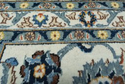 Central medallion detail of 2000s Kashan rug from Iran / Persia