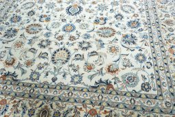 Close-up detail of 2000s Kashan rug from Iran / Persia showing Wool weave