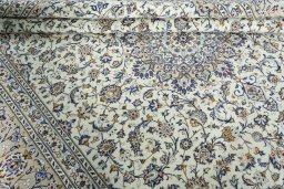 Close-up detail of 2000s Kashan rug from Iran / Persia showing Wool weave