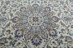 Central medallion detail of 2000s Kashan rug from Iran / Persia