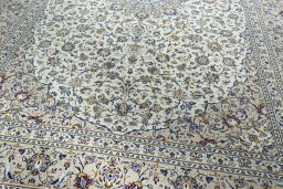 Close-up detail of 2000s Kashan rug from Iran / Persia showing Wool weave