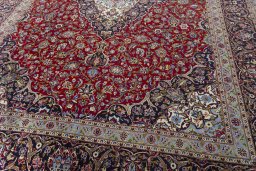 Close-up detail of New Kashan rug from Iran / Persia showing Wool weave
