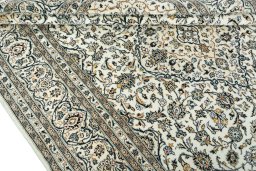 Close-up detail of 2000s Kashan rug from Iran / Persia showing Wool weave