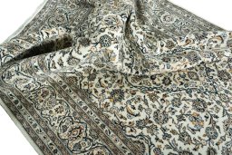 Surface texture of 2000s Kashan rug with natural Wool and intricate pattern