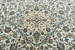 Central medallion detail of 2000s Kashan rug from Iran / Persia