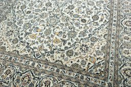 Close-up detail of 2000s Kashan rug from Iran / Persia showing Wool weave