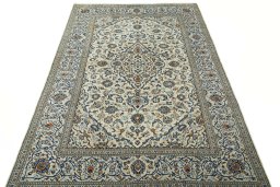 Surface texture of 2000s Kashan rug with natural Wool and intricate pattern