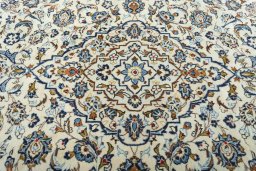 Central medallion detail of 2000s Kashan rug from Iran / Persia